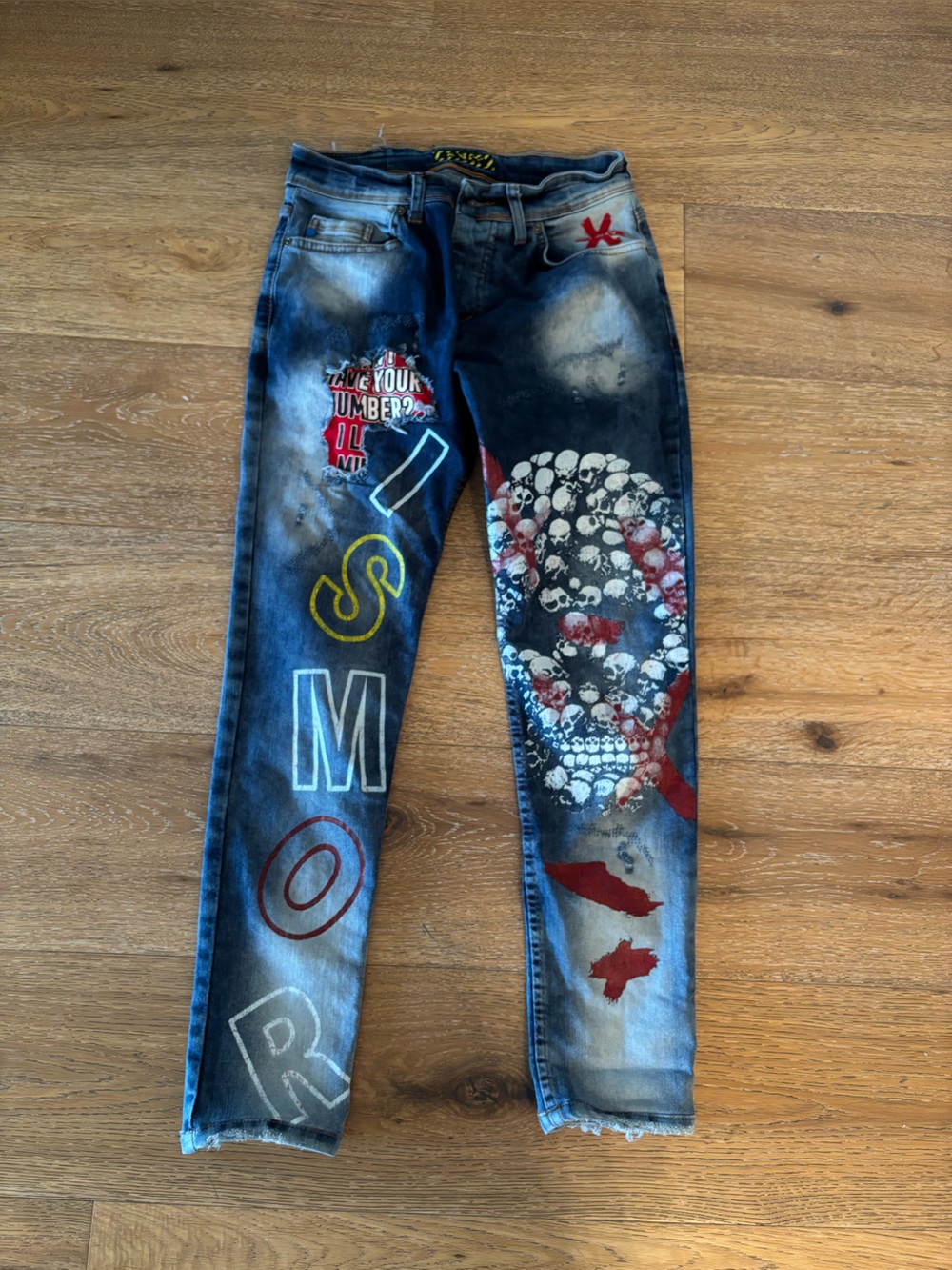 Women’s Painted Blue Denim Jeans with Multi-Color Graphic Details